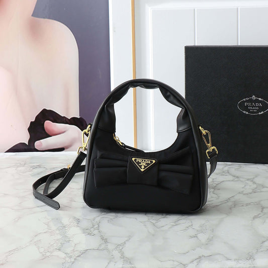 Nylon Paneled Leather Bow Armpit Shoulder Bag